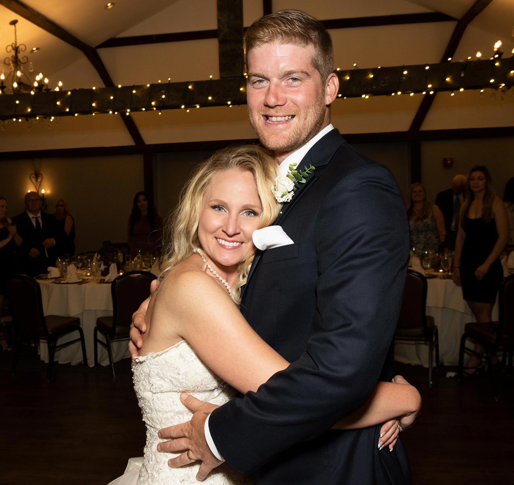 Young Bridal couple dancing at their summer wedding