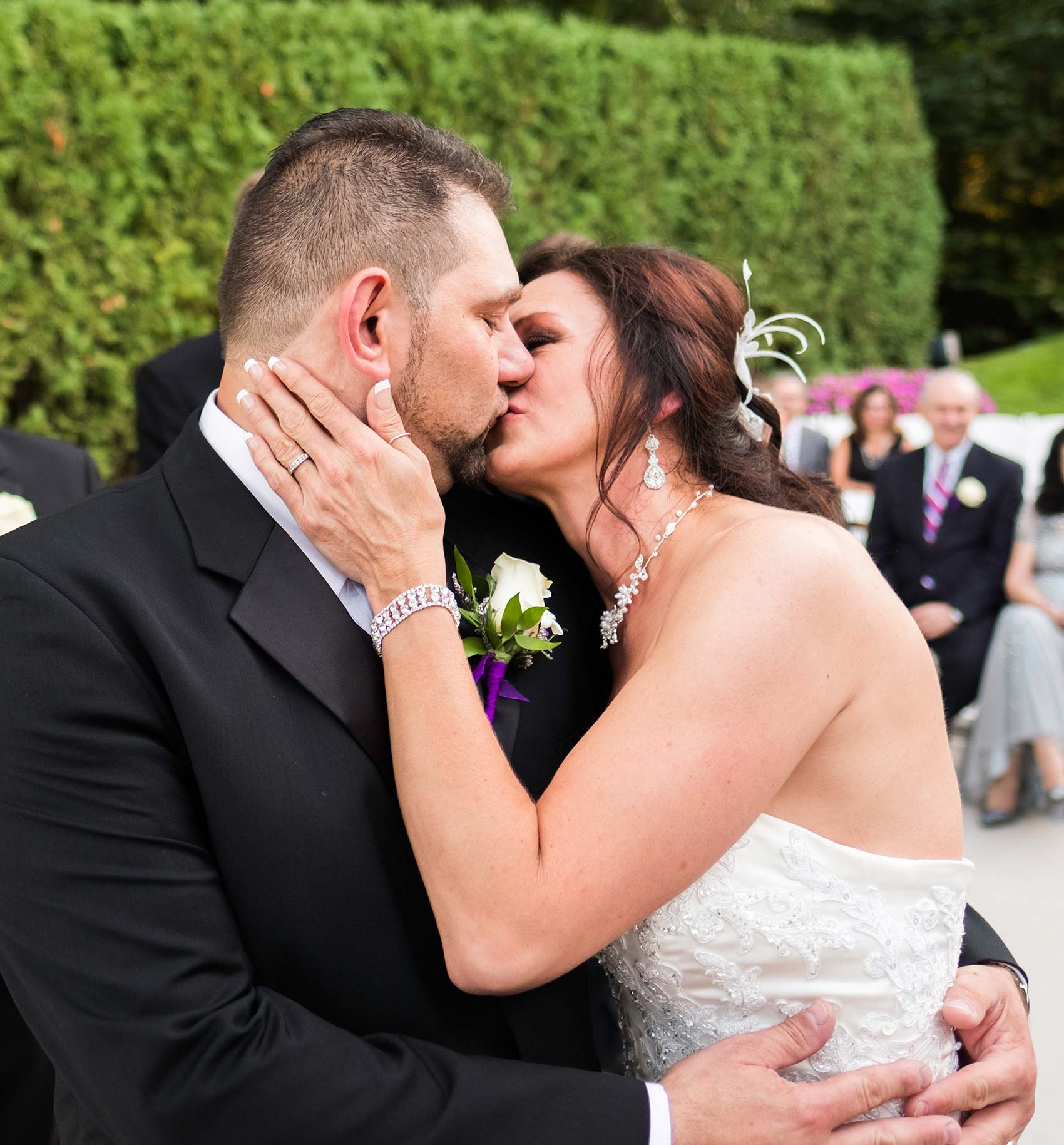 Bride-kissing-groom-at-Conn-Summer-wedding