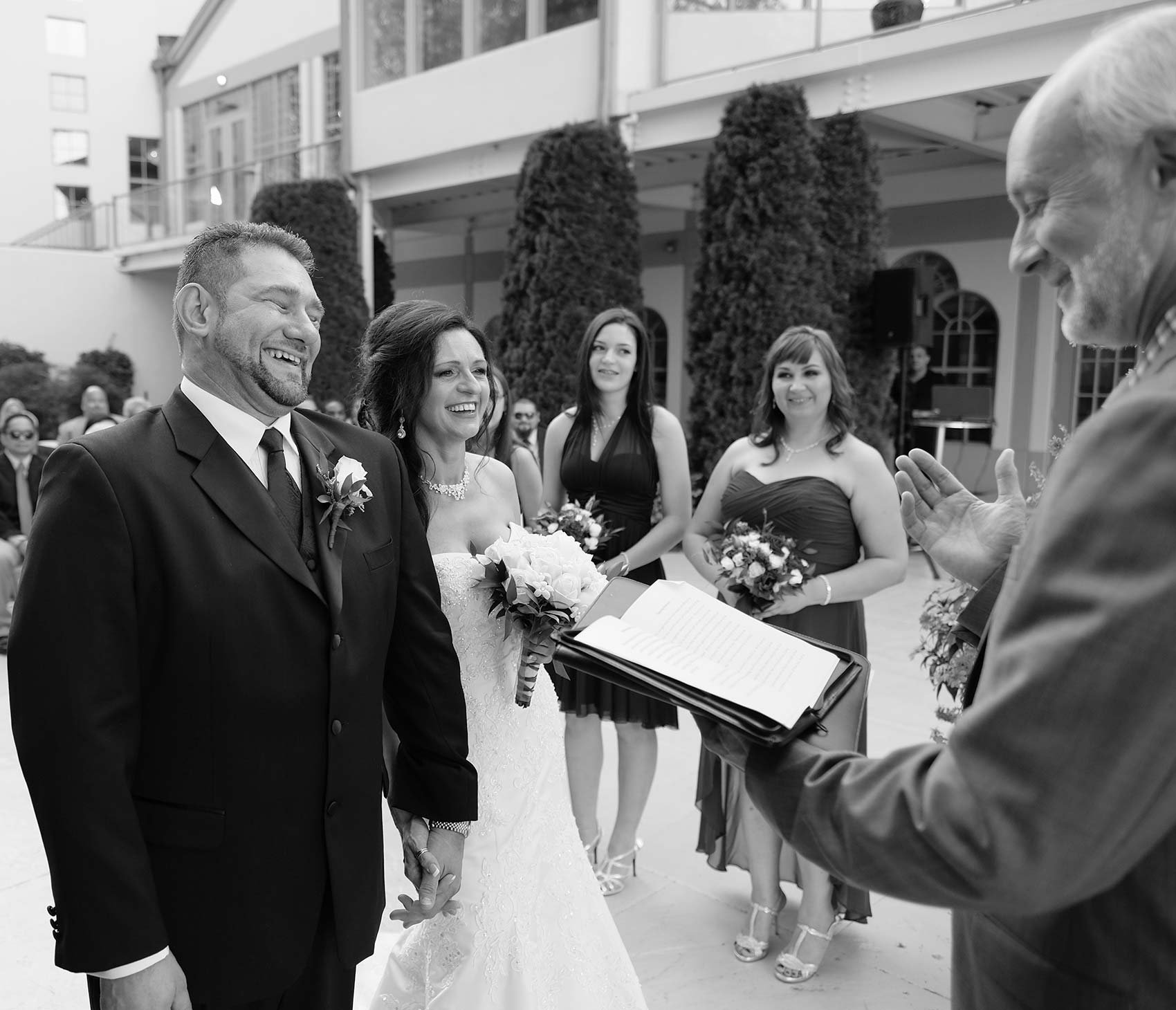 Groom-laughing-during-wedding-ceremony-in-CT-wedding